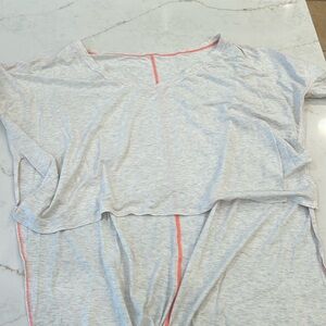 Light grey lululemon short sleeve, light weight bright pink outline, flowy back